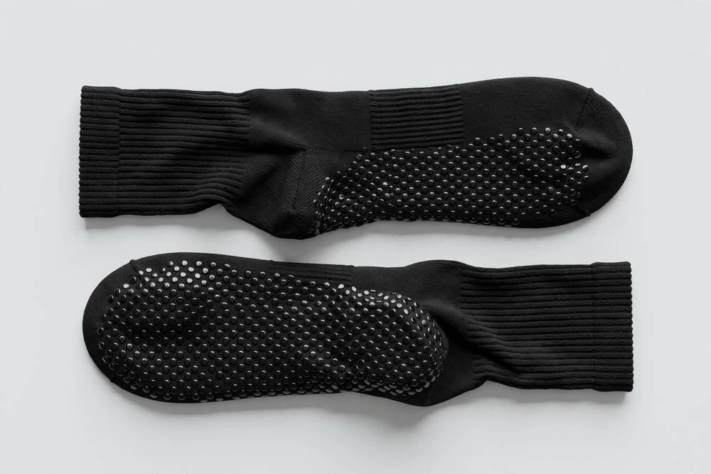 Grip socks with non-slip dotted soles — illustrative photo